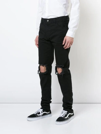 Shop Christian Dada Ripped Effect Jeans In Black