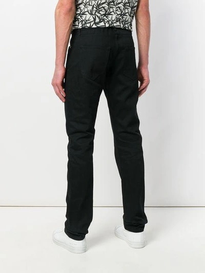 Shop Saint Laurent Slim Fit Classic Jeans - Black