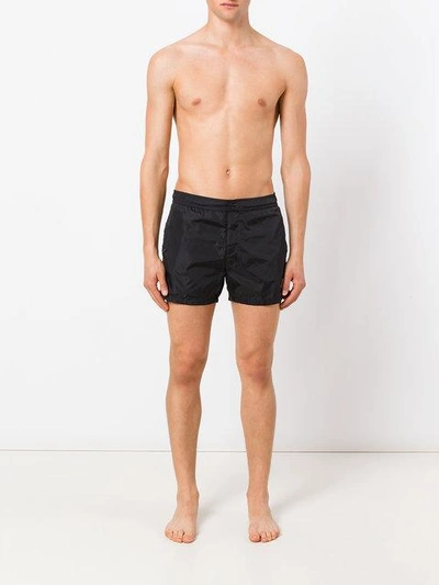 Shop Moncler Striped Trim Swim Shorts In Black
