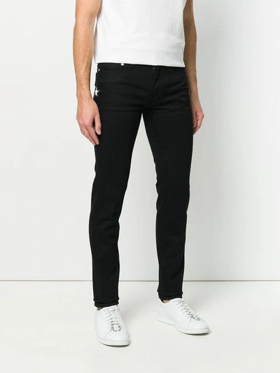 Shop Givenchy Slim-fit Jeans - Black