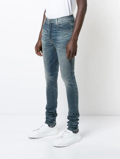Shop Amiri Stack Jeans In Blue