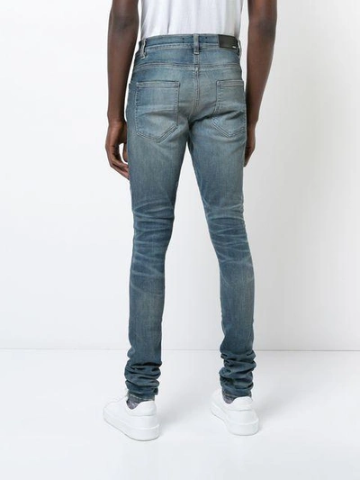 Shop Amiri Stack Jeans In Blue