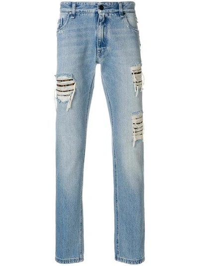Shop Fendi Distressed Patch Jeans In Blue
