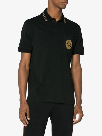 Shop Versace Medusa Embroidered Polo Shirt - Black