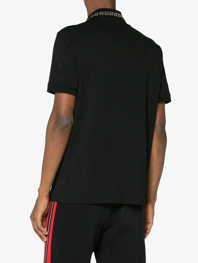 Shop Versace Medusa Embroidered Polo Shirt - Black