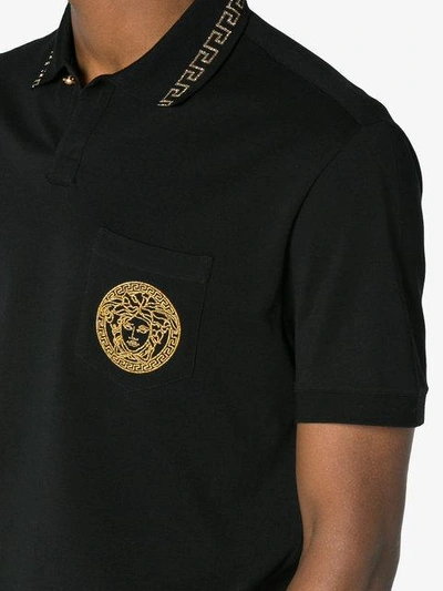 Shop Versace Medusa Embroidered Polo Shirt - Black