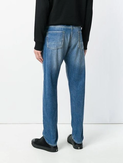 Shop Alexander Mcqueen Distressed Folk Embroidery Jeans In Blue