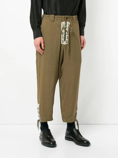 Shop Yohji Yamamoto Loose Fit Cropped Trousers In Green