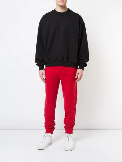 Shop Fear Of God Drawstring Track Pants - Red