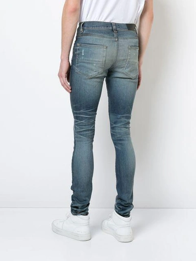 Shop Amiri Stack Jeans - Blue