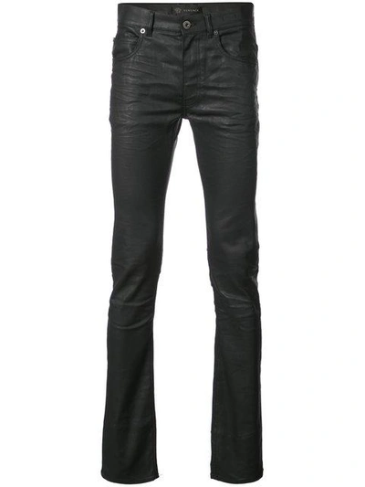 Shop Versace Waxed Skinny Jeans
