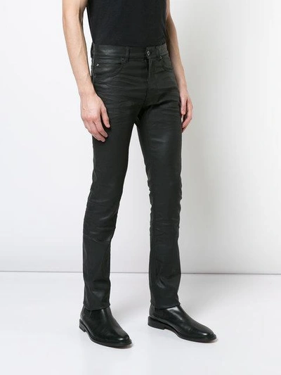 Shop Versace Waxed Skinny Jeans