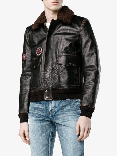 Leather flight jacket with patches