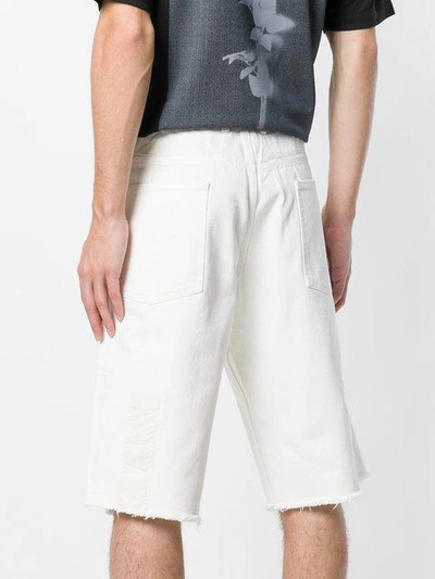 Shop Upww Frayed Hem Denim Shorts In White