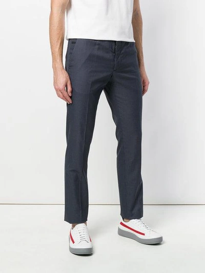 Shop Prada Micro-checked Trousers