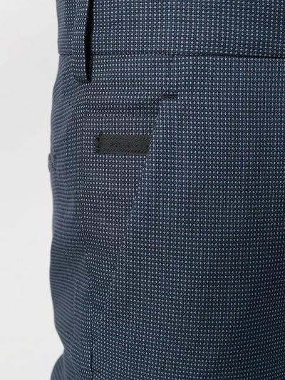 Shop Prada Micro-checked Trousers
