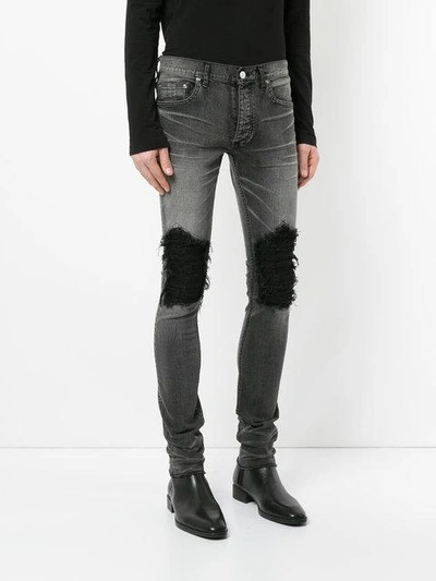 Shop Fagassent Ripped Skinny Jeans In Grey