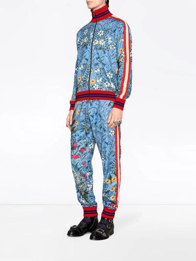 Shop Gucci New Flora Technical Jersey Trousers - Blue