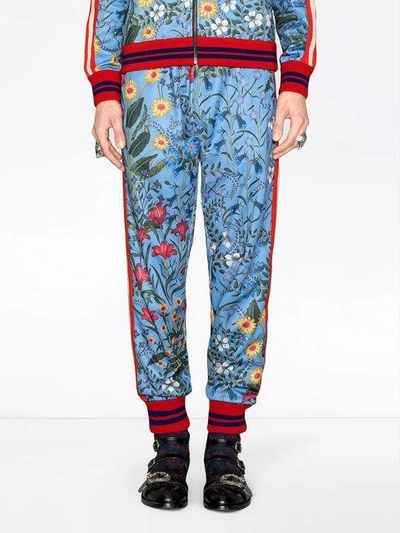 Shop Gucci New Flora Technical Jersey Trousers - Blue