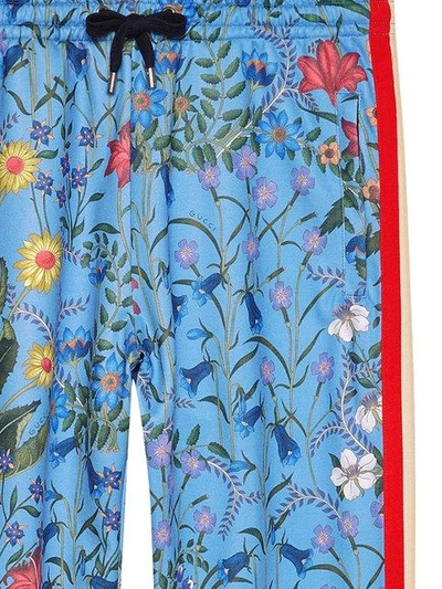 Shop Gucci New Flora Technical Jersey Trousers - Blue