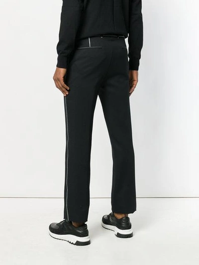 Shop Givenchy Contrasting Stitching Jogging Pants - Black
