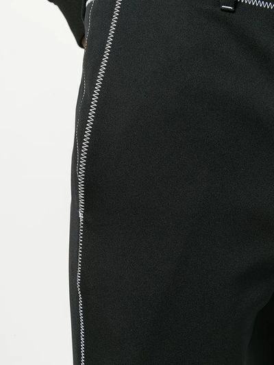 Shop Givenchy Contrasting Stitching Jogging Pants - Black