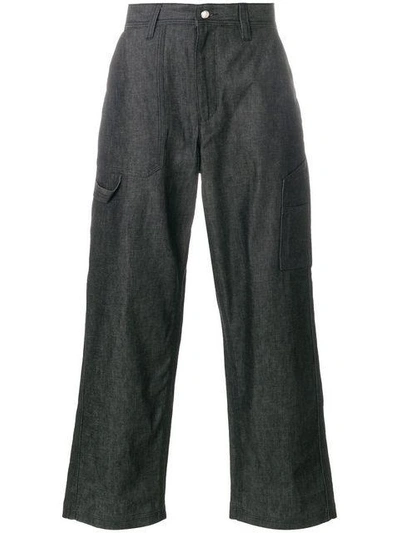 Shop White Mountaineering Wide Leg Trousers In Black