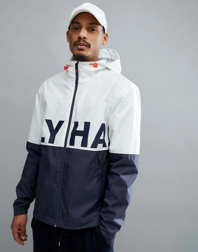 Shop Helly Hansen Amaze Logo Jacket In White/navy - White