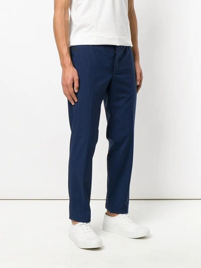 Shop Prada Slim Fit Trousers - Blue