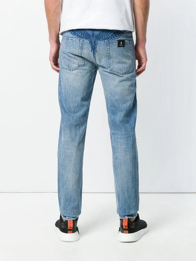 Shop Marcelo Burlon County Of Milan Jeans Mit Schmalem Bein In Blue