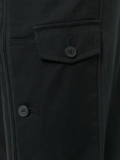 Shop Les Hommes Cargo Trousers In Black