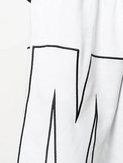 Shop Msgm Logo Print Track Shorts In White