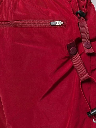 Shop White Mountaineering Wide Leg Track Pants In Red