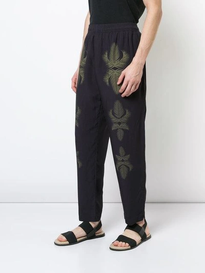 Shop Osklen Leaf Print Sweat Pants
