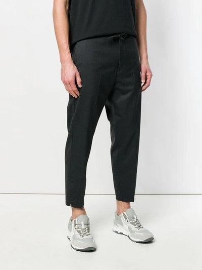 Shop Oamc Cropped Drawstring Trousers In Grey