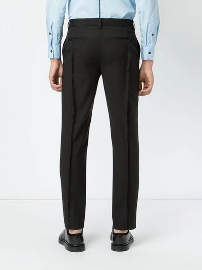 Shop Yang Li Fringed Pleat Detailed Trousers - Black