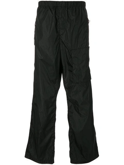 Shop Givenchy Loose Fit Trousers In Black