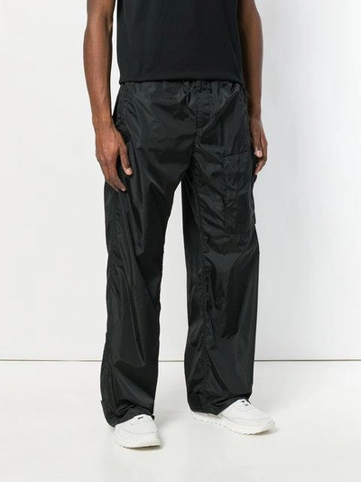 Shop Givenchy Loose Fit Trousers In Black