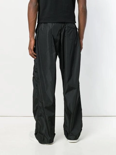 Shop Givenchy Loose Fit Trousers In Black