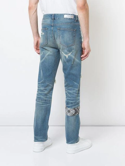 Shop God's Masterful Children Ripped Paisley Insert Jeans In Blue