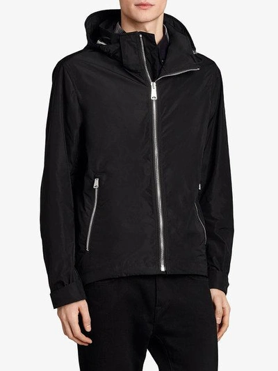 Shop Burberry Packaway Hood Showerproof Jacket In Black