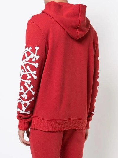 Shop Amiri Bones Pullover Hoodie - Red