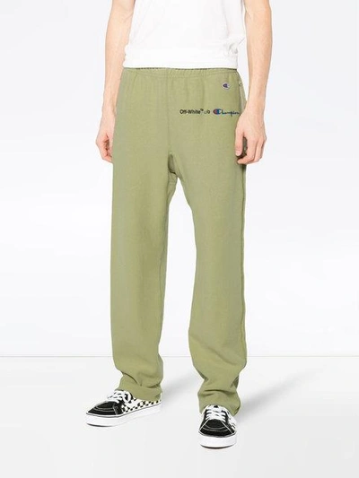 Shop Off-white X Champion Sweatpants In Green