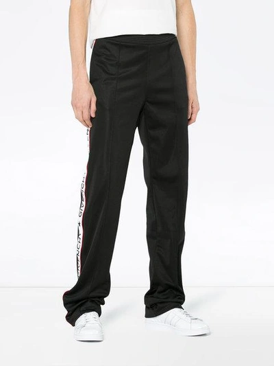 Shop Givenchy Logo Stripe Joggers In Black