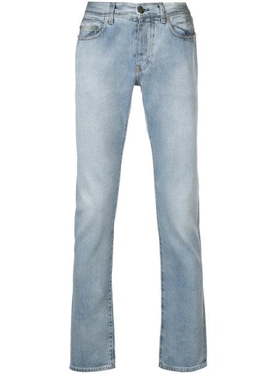 Shop Saint Laurent Slim Jeans In Blue