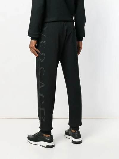 Shop Versace Logo Print Track Pants