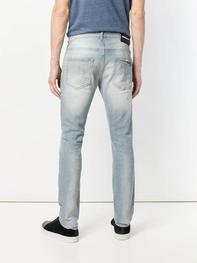 Shop Pierre Balmain Faded Skinny Jeans In Blue