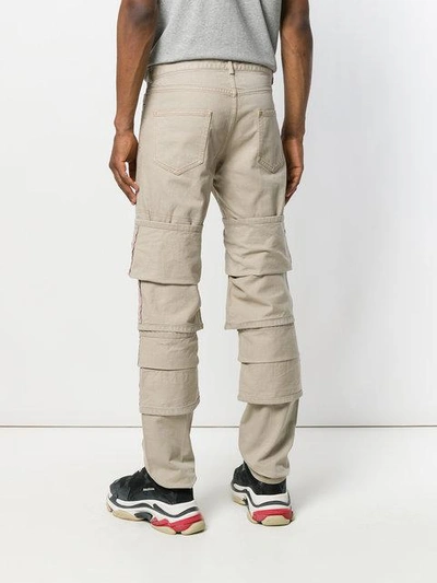 layered straight-leg jeans