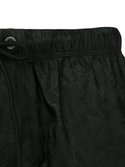 Shop Versace Tonal Brocade Print Sim Shorts - Black