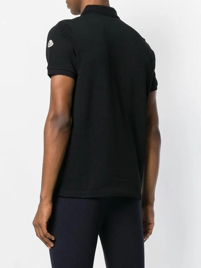 Shop Moncler Klassisches Poloshirt In Black